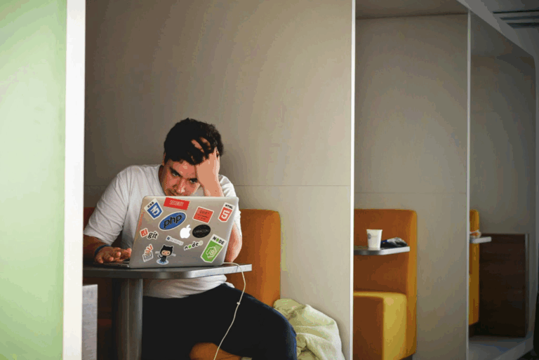 College Student Studying Class Notes to Sell Online as a Side Hustle for Extra Money